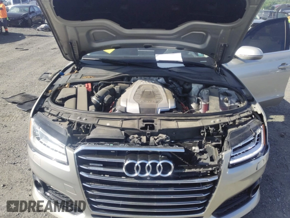 2017 Audi A8 with VIN WAU44AFD3HN014802, listed as a IAAI auction lot 42573537 with 121,096 mi miles and . Bid and sale history available at DreamBid. Image 10.