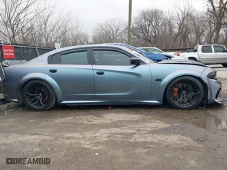 2020 Dodge Charger Scat Pack with VIN 2C3CDXGJ7LH157411, listed as a IAAI auction lot 41226695 with 52,108 mi miles. Bid and sale history available at carsss.com. Image 13.