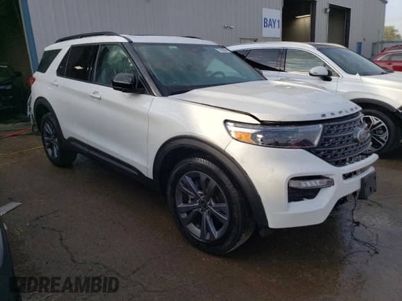 2022 Ford Explorer XLT with VIN 1FMSK8DH9NGC15548, listed as a Copart auction lot 77819694 with 23,087 mi miles and Salvage Title. Bid and sale history available at DreamBid. Image 4.