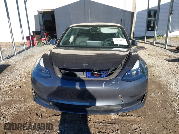 2023 Tesla Model 3 with VIN 5YJ3E1EA3PF673642, listed as a IAAI auction lot 40818151 with 12,293 mi miles and . Bid and sale history available at carsss.com. Image 13.