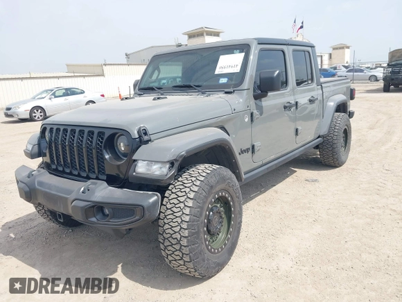 2021 Jeep Gladiator Sport S z VIN 1C6JJTAM1ML607525, wystawiony jako IAAI lot #41941550 z przebiegiem 59 283 mil mil oraz . Historia ofert i sprzedaży dostępna na DreamBid. Obrazek 17.