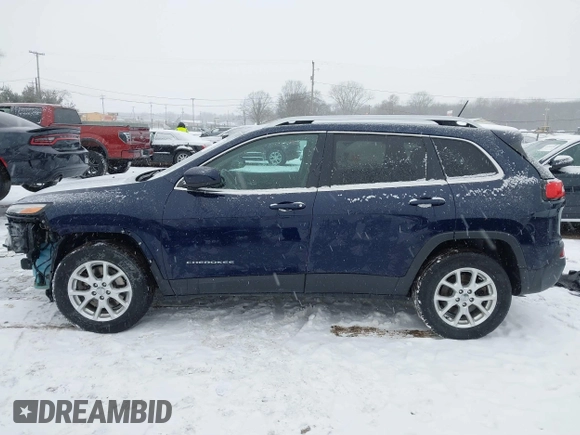 2014 Jeep Cherokee Altitude with VIN 1C4PJMCB9EW187288, listed as a IAAI auction lot 41320161 with 169,534 mi miles and . Bid and sale history available at DreamBid. Image 15.