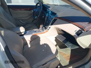 2008 Cadillac CTS RWD z VIN 1G6DV57V280142396, wystawiony jako IAAI lot #42086055 z przebiegiem 183 113 mil mil oraz . Historia ofert i sprzedaży dostępna na DreamBid. Obrazek 5.
