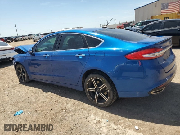 2018 Ford Fusion Titanium z VIN 3FA6P0D93JR187966, wystawiony jako Copart lot #54171825 z przebiegiem 86 575 mil mil oraz Szkoda całkowita • Salvage title. Historia ofert i sprzedaży dostępna na DreamBid. Obrazek 2.
