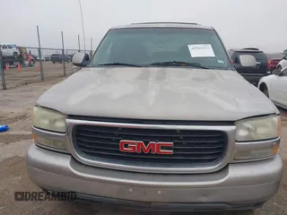 2003 GMC Yukon SLT with VIN 1GKEC13V33J287668, listed as a IAAI auction lot 41561108 with 326,719 mi miles. Bid and sale history available at carsss.com. Image 6.
