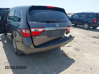 2012 Honda Odyssey EX with VIN 5FNRL5H41CB011940, listed as a IAAI auction lot 42033966 with 182,996 mi miles and . Bid and sale history available at DreamBid. Image 6.
