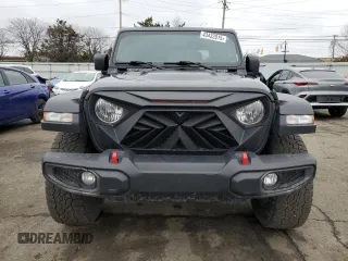 2023 Jeep Gladiator Rubicon with VIN 1C6JJTBG6PL500516, listed as a Copart auction lot 43432015 with 107,096 mi miles and Salvage title. Bid and sale history available at DreamBid. Image 5.
