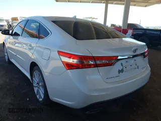 2015 Toyota Avalon Limited with VIN 4T1BK1EB2FU170909, listed as a IAAI auction lot 42035089 with 239,385 mi miles and . Bid and sale history available at DreamBid. Image 3.