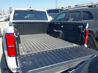 2024 Toyota Tacoma 4WD SR5 with VIN 3TMLB5JN1RM050446, listed as a IAAI auction lot 41658922 with 9,369 mi miles. Bid and sale history available at carsss.com. Image 16.