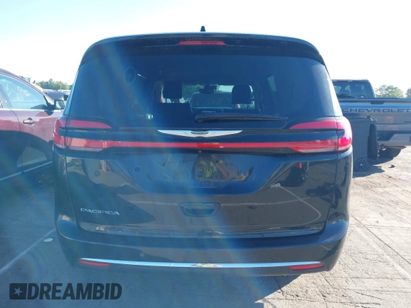 2022 Chrysler Pacifica Touring L with VIN 2C4RC1BG9NR117538, listed as a IAAI auction lot 42318518 with 103,311 mi miles and . Bid and sale history available at DreamBid. Image 17.