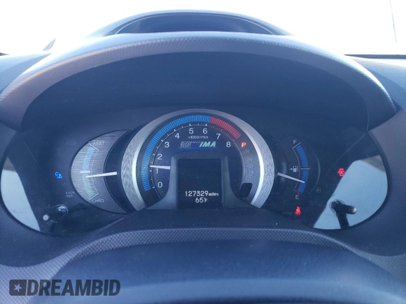 2010 Honda Insight EX with VIN JHMZE2H73AS039935, listed as a Copart auction lot 46192575 with 127,329 mi miles and Salvage Title. Bid and sale history available at DreamBid. Image 9.