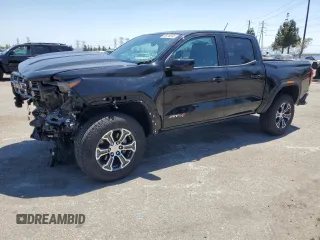 2023 GMC Canyon 4WD AT4 z VIN 1GTP6DEK8P1268779, wystawiony jako Copart lot #56416565 z przebiegiem 31 072 mil mil oraz Szkoda całkowita • Salvage title. Historia ofert i sprzedaży dostępna na DreamBid. Obrazek 1.