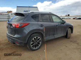 2016 Mazda CX-5 Grand Touring z VIN JM3KE4DY0G0633861, wystawiony jako Copart lot #47748645 z przebiegiem 112 219 mil mil oraz Szkoda całkowita • Salvage title. Historia ofert i sprzedaży dostępna na DreamBid. Obrazek 3.
