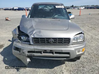 1999 Toyota RAV4 with VIN JT3GP10V5X7053634, listed as a Copart auction lot 52761695 with 236,443 mi miles and Salvage title. Bid and sale history available at DreamBid. Image 5.