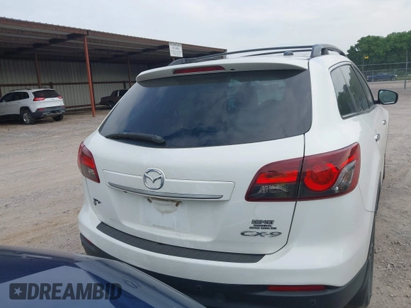 2015 Mazda CX-9 Grand Touring with VIN JM3TB2DA7F0448886, listed as a IAAI auction lot 42440203 with 108,765 mi miles and . Bid and sale history available at DreamBid. Image 16.