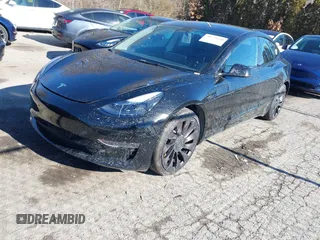2021 Tesla Model 3 Performance with VIN 5YJ3E1EC5MF090518, listed as a IAAI auction lot 38775658 with 14,118 mi miles and . Bid and sale history available at carsss.com. Image 2.