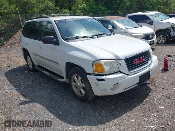 2003 GMC Envoy SLT with VIN 1GKDS13S632266506, listed as a IAAI auction lot 42149049 with 259,884 mi miles and . Bid and sale history available at DreamBid. Image 1.