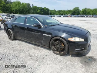 2014 Jaguar XJ with VIN SAJWA2GZ7E8V60213, listed as a Copart auction lot 53382454 with 88,870 mi miles and Salvage Title. Bid and sale history available at carsss.com. Image 4.