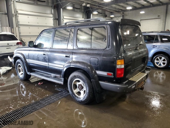 1997 Toyota Land Cruiser with VIN JT3HJ85J0V0184304, listed as a Copart auction lot 72438414 with 310,213 mi miles and Clean Title. Bid and sale history available at carsss.com. Image 2.