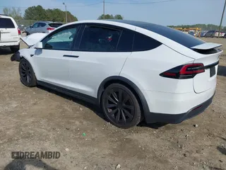 2022 Tesla Model X Plaid z VIN 7SAXCBE6XNF340704, wystawiony jako IAAI lot #41928524 z przebiegiem Nie podano mil oraz . Historia ofert i sprzedaży dostępna na DreamBid. Obrazek 3.