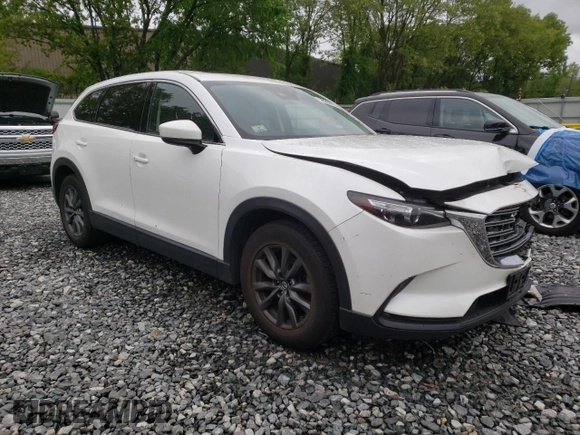 2022 Mazda CX-9 Touring with VIN JM3TCBCYXN0619317, listed as a Copart auction lot 58264755 with 139,478 mi miles and Salvage title. Bid and sale history available at DreamBid. Image 4.