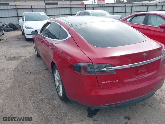 2013 Tesla Model S with VIN 5YJSA1CN9DFP09973, listed as a IAAI auction lot 41657188 with 61,546 mi miles. Bid and sale history available at carsss.com. Image 3.