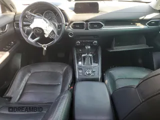 2018 Mazda CX-5 Grand Touring с VIN JM3KFBDM5J0323923, выставлен на аукционе Copart как лот 58162435 с пробегом 144 792 миль миль и Списание • Salvage title. История ставок и продаж доступна на DreamBid. Изображение 8.