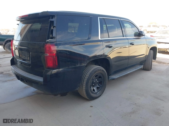 2018 Chevrolet Tahoe Commercial with VIN 1GNSKDEC8JR351269, listed as a IAAI auction lot 41602443 with 79,970 mi miles. Bid and sale history available at carsss.com. Image 4.