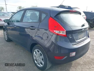 2013 Ford Fiesta SE with VIN 3FADP4EJ6DM205708, listed as a IAAI auction lot 42051721 with 139,143 mi miles. Bid and sale history available at carsss.com. Image 3.