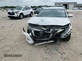 2022 Nissan Sentra S z VIN 3N1AB8BVXNY239593, wystawiony jako Copart lot #59677735 z przebiegiem 48 818 mil mil oraz Szkoda całkowita • Salvage title. Historia ofert i sprzedaży dostępna na DreamBid. Obrazek 14.