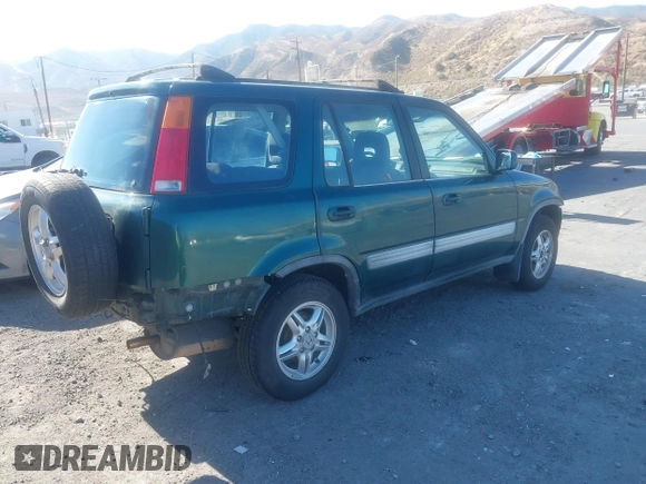 1999 Honda CR-V EX with VIN JHLRD1860XC028421, listed as a IAAI auction lot 39978382 with 222,122 mi miles. Bid and sale history available at carsss.com. Image 4.