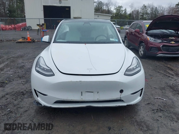 2020 Tesla Model Y Long Range with VIN 5YJYGDEE4LF044843, listed as a IAAI auction lot 41799504 with 40,770 mi miles and . Bid and sale history available at DreamBid. Image 12.