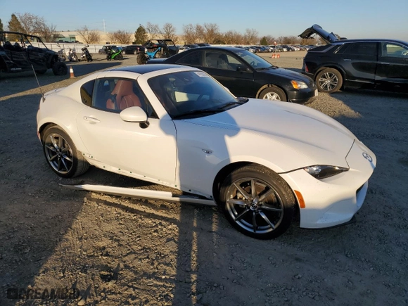 2023 Mazda MX-5 Miata RF Grand Touring with VIN JM1NDAM78P0559149, listed as a Copart auction lot 41830395 with 10,714 mi miles and Salvage Title. Bid and sale history available at carsss.com. Image 4.