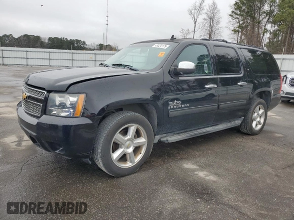 2014 Chevrolet Suburban LT with VIN 1GNSCJE05ER138819, listed as a Copart auction lot 43324175 with 218,114 mi miles and Salvage Title. Bid and sale history available at carsss.com. Image 1.