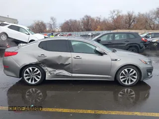 2015 Kia Optima SX Turbo with VIN 5XXGR4A66FG361755, listed as a IAAI auction lot 41199887 with 114,179 mi miles. Bid and sale history available at carsss.com. Image 13.