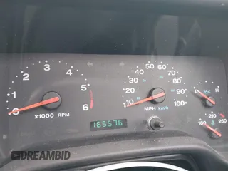 2003 Jeep Wrangler X with VIN 1J4FA39S23P300447, listed as a IAAI auction lot 41791733 with 165,576 mi miles. Bid and sale history available at carsss.com. Image 7.
