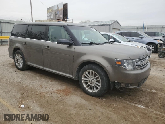 2013 Ford Flex SEL z VIN 2FMGK5C89DBD37239, wystawiony jako Copart lot #86277644 z przebiegiem 127 866 mil mil oraz Szkoda całkowita • Salvage title. Historia ofert i sprzedaży dostępna na DreamBid. Obrazek 4.
