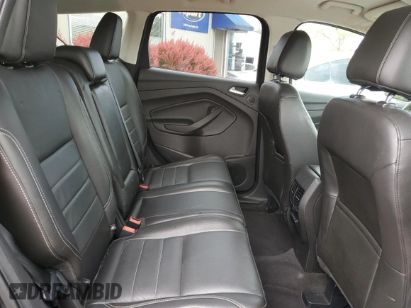 2015 Ford Escape Titanium with VIN 1FMCU0JX5FUA24210, listed as a Copart auction lot 57270855 with 115,613 mi miles and Salvage title. Bid and sale history available at DreamBid. Image 11.