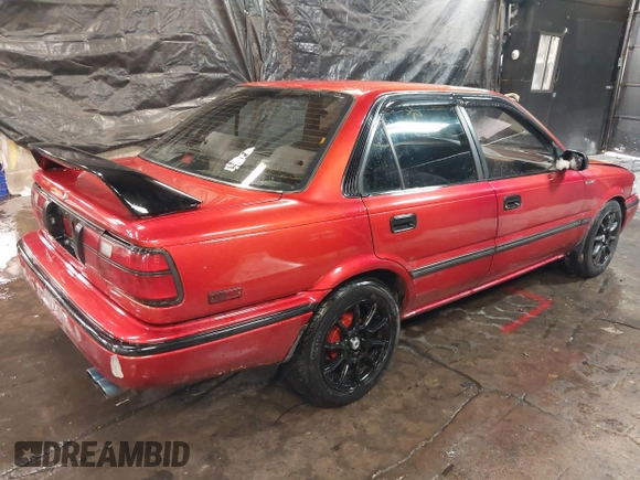 1991 Toyota Corolla with VIN 2T1AE94A4MC063109, listed as a IAAI auction lot 41357536 with 81,958 mi miles and . Bid and sale history available at DreamBid. Image 4.