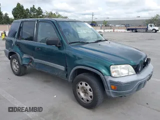 1999 Honda CR-V LX with VIN JHLRD2847XC014469, listed as a IAAI auction lot 41987027 with 307,727 mi miles. Bid and sale history available at carsss.com. Image 1.