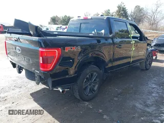 2023 Ford F-150 XL with VIN 1FTFW1E86PKF25964, listed as a IAAI auction lot 41472620 with 49,438 mi miles. Bid and sale history available at carsss.com. Image 4.