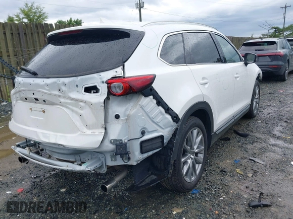 2019 Mazda CX-9 Signature with VIN JM3TCBEY6K0307102, listed as a IAAI auction lot 42645716 with 55,299 mi miles and . Bid and sale history available at DreamBid. Image 4.