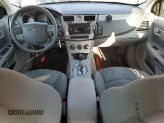 2007 Chrysler Sebring with VIN 1C3LC46K37N679316, listed as a Copart auction lot 57959095 with 146,181 mi miles and Salvage title. Bid and sale history available at DreamBid. Image 8.