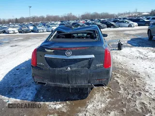 2014 Cadillac CTS Luxury AWD with VIN 1G6AX5SX3E0191673, listed as a IAAI auction lot 41617087 with 68,581 mi miles and . Bid and sale history available at DreamBid. Image 16.