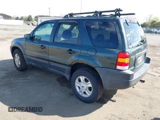 2003 Ford Escape XLT Popular 2 with VIN 1FMYU93113KB33578, listed as a IAAI auction lot 41985463 with 103,500 mi miles and . Bid and sale history available at DreamBid. Image 3.