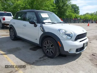 2012 MINI Countryman S z VIN WMWZC5C5XCWM11911, wystawiony jako IAAI lot #42252488 z przebiegiem 154 010 mil mil oraz . Historia ofert i sprzedaży dostępna na DreamBid. Obrazek 1.