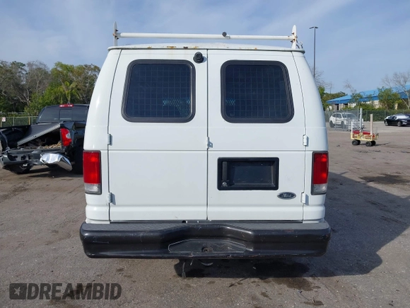 2001 Ford Econoline Cargo with VIN 1FTRE14291HA84414, listed as a IAAI auction lot 41463623 with 192,835 mi miles. Bid and sale history available at carsss.com. Image 17.