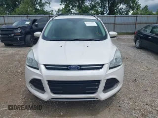 2016 Ford Escape Titanium z VIN 1FMCU9J90GUC76504, wystawiony jako IAAI lot #42552851 z przebiegiem 89 570 mil mil oraz . Historia ofert i sprzedaży dostępna na DreamBid. Obrazek 13.