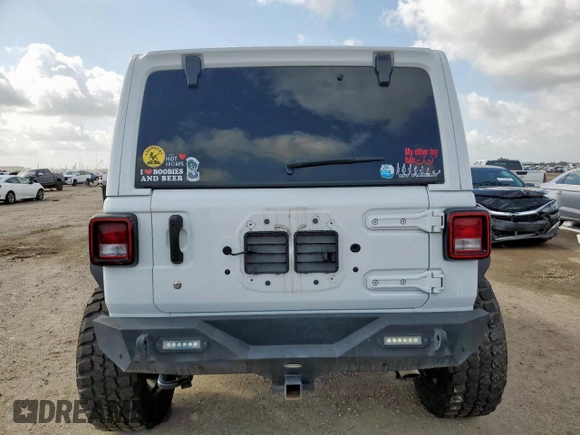 2019 Jeep Wrangler Unlimited Sahara z VIN 1C4HJXEG3KW635681, wystawiony jako Copart lot #60734065 z przebiegiem 75 020 mil mil oraz Szkoda całkowita • Salvage title. Historia ofert i sprzedaży dostępna na DreamBid. Obrazek 6.