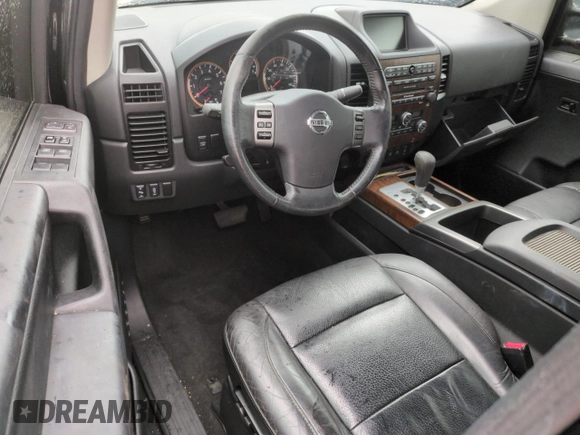 2010 Nissan Titan LE with VIN 1N6BA0EC8AN318538, listed as a Copart auction lot 74122194 with Not Provided miles and Salvage Title. Bid and sale history available at carsss.com. Image 8.